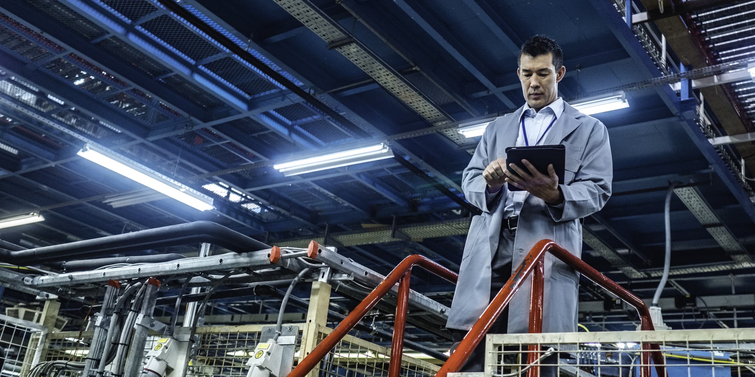 Engineer supervising autonomous production process