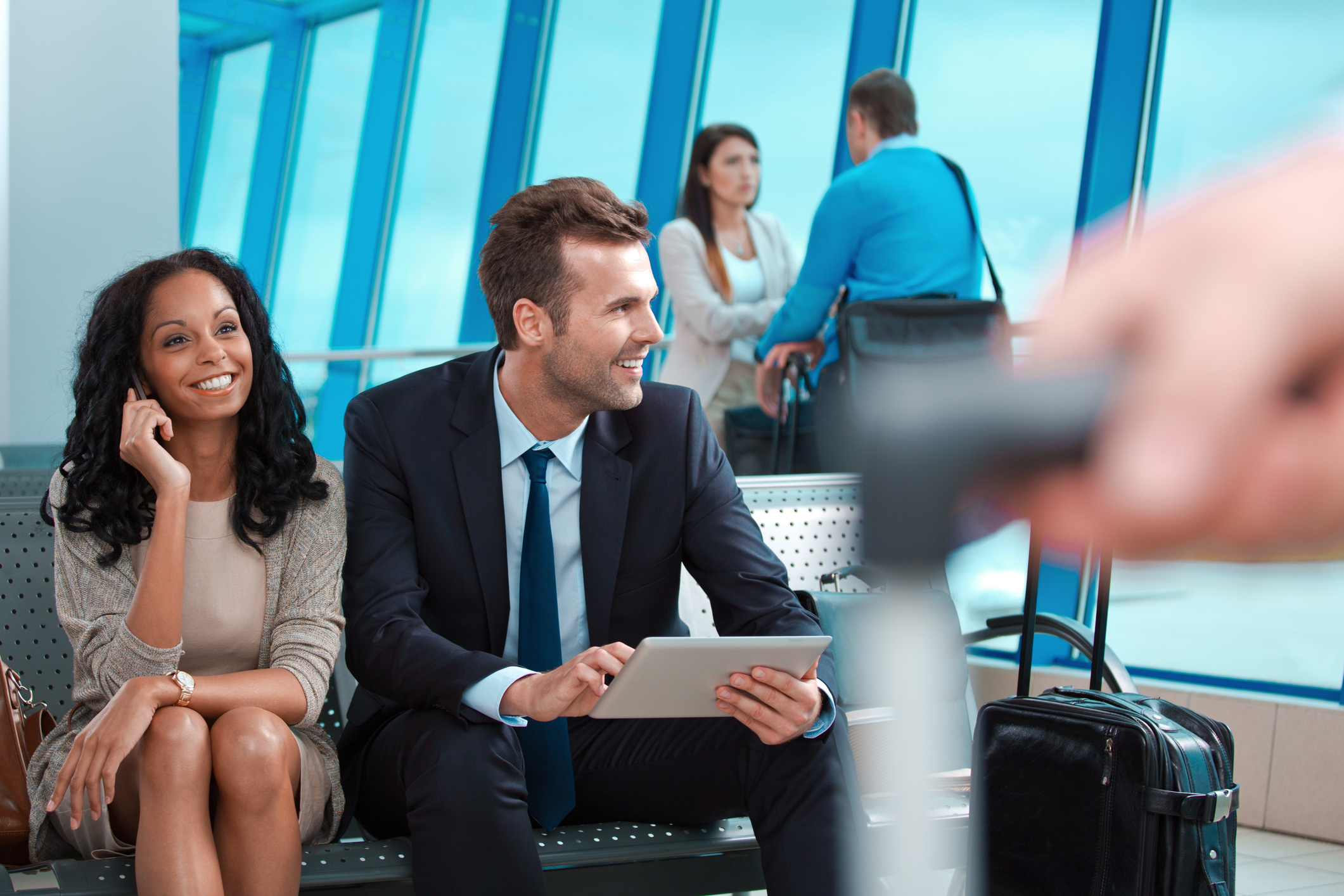 Business people waiting for the flight at airport